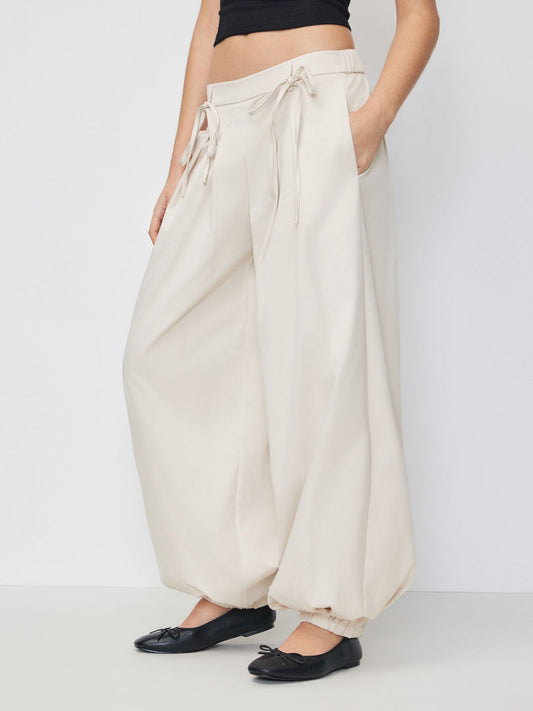 Cream Low‑Rise Drawstring Barrel‑Leg Balloon Trousers